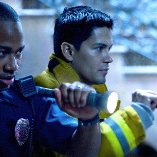 Columbus Short stars as Wilensky and Jay Hernandez stars as Jake in Screen Gems' Quarantine (2008). Photo by John Bramley.