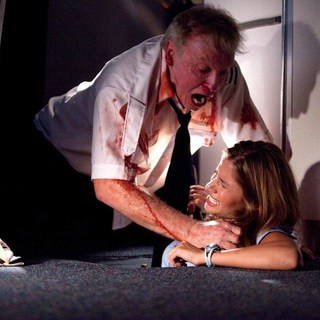 John Curran stars as Captain Forrest and Bre Blair stars as Paula in Samuel Goldwyn Films' Quarantine 2: Terminal (2011)
