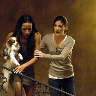Dania Ramirez stars as Sadie and Jennifer Carpenter stars as Angela Vidal in Screen Gems' Quarantine (2008)