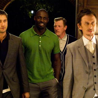 Gerard Butler, Idris Elba, Geoff Bell and Matt King in Warner Bros Pictures' RocknRolla (2008). Photo credit by Alex Bailey.