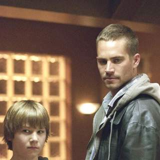 Alex Neuberger and Paul Walker in New Line Cinema's Running Scared (2006)