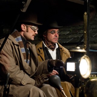 Jude Law stars as Dr. John Watson and Robert Downey Jr. stars as Sherlock Holmes in Warner Bros. Pictures' Sherlock Holmes: A Game of Shadows (2011)