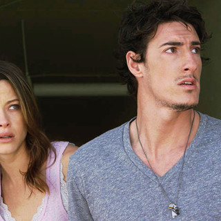 Scottie Thompson stars as Elaine and Eric Balfour stars as Jarrod in Rogue Pictures' Skyline (2010)