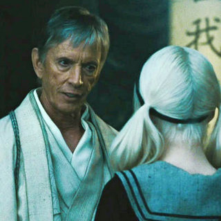 Scott Glenn stars as Wiseman and Emily Browning stars as Baby Doll in Warner Bros. Pictures' Sucker Punch (2011)