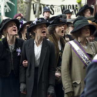 Carey Mulligan stars as Maud Watts and Helena Bonham Carter stars as Edith Ellyn in Focus Features' Suffragette (2015)