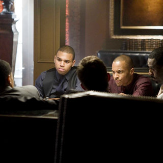Chris Brown stars as Jesse Attica and T.I. stars as Ghost in Screen Gems' Takers (2010)