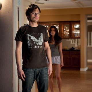 Sebastian Stan stars as Ben and Ashley Greene stars as Kelly in Warner Bros. Pictures' The Apparition (2012)