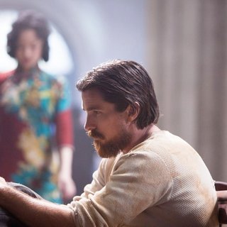 Ni Ni stars as Yu Mo and Christian Bale stars as John Miller in Wrekin Hill Entertainment's The Flowers of War (2012)