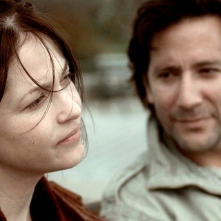 Nicki Aycox stars as Lexi and Henry Ian Cusick stars as Danny Hart in Monterey Media's The Girl on the Train (2014)