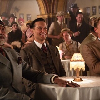 Tobey Maguire stars as Nick Carraway and Leonardo DiCaprio stars as Jay Gatsby in Warner Bros. Pictures' The Great Gatsby (2013)