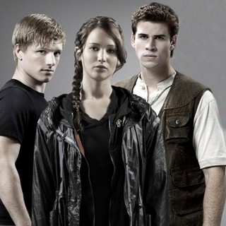 Josh Hutcherson, Jennifer Lawrence and Liam Hemsworth in Lionsgate Films' The Hunger Games (2012)