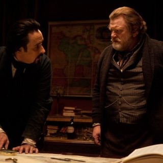John Cusack stars as Edgar Allan Poe and Brendan Gleeson stars as Captain Hamilton in Relativity Media's The Raven (2012)