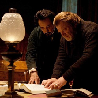 John Cusack stars as Edgar Allan Poe and Brendan Gleeson stars as Captain Hamilton in Relativity Media's The Raven (2012)