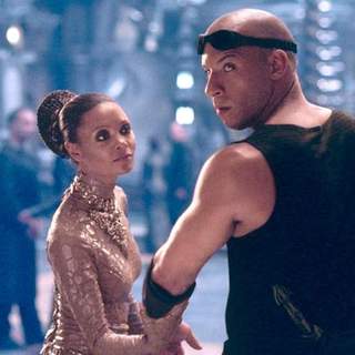 Thandie Newton and Vin Diesel in Universal Pictures' The Chronicles of Riddick (2004)