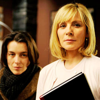 Olivia Williams stars as Ruth Lang  Kim Cattrall stars as Amelia Bly in Summit International's The Ghost Writer (2010)