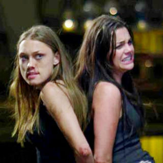 Clare Grant stars as Megan Graves and Jillian Murray stars as Abby Graves in After Dark Films' The Graves (2010)