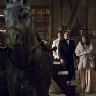 (L to R) Alex O'Connell (LUKE FORD) is joined by his parents, Rick (BRENDAN FRASER) and Evelyn (MARIA BELLO) in The Mummy: Tomb of the Dragon Emperor.