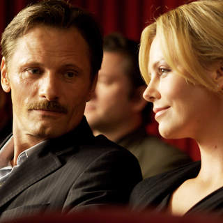 Viggo Mortensen stars as Father and Charlize Theron stars as Wife in Dimension Films' The Road (2009)
