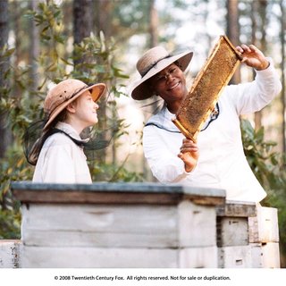 Dakota Fanning stars as Lily Owens and Queen Latifah stars as August Boatwright in Fox Searchlight Pictures' The Secret Life of Bees (2008)