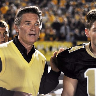 Kurt Russell stars as Coach Hand and Brian Presley stars as Scott Murphy in Anchor Bay Films' Touchback (2012)