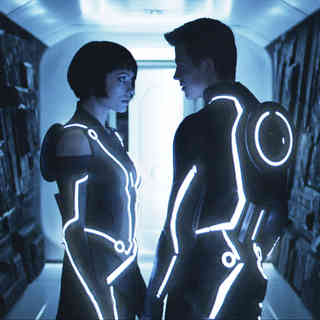 Olivia Wilde stars as Quorra and Garrett Hedlund stars as Sam Flynn in Walt Disney Pictures' Tron Legacy (2010)