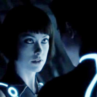 Olivia Wilde stars as Quorra and Garrett Hedlund stars as Sam Flynn in Walt Disney Pictures' Tron Legacy (2010)