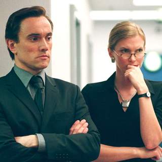 BEN MILES as Dascomb and COSIMA SHAW as Patricia in WB Pictures' and Virtual Studios' action thriller "V for Vendetta". Photo by David Appleby.
