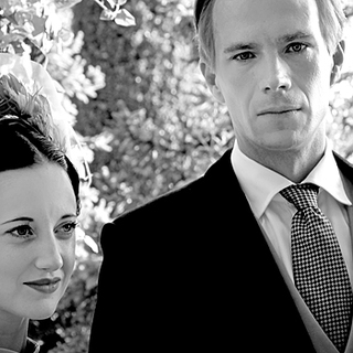 Andrea Riseborough stars as Wallis and James D'Arcy stars as King Edward VIII in The Weinstein Company's W.E. (2012)