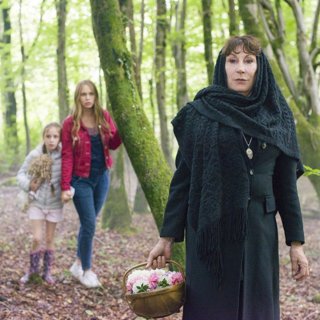 Dixie Egerickx, Tallulah Evans and Anjelica Huston in Lifetime's The Watcher in the Woods (2017)