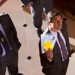 Ted Griffin stars as Agent Hughes and Kyle Chandler stars as Agent Patrick Denham in Paramount Pictures' The Wolf of Wall Street (2013)