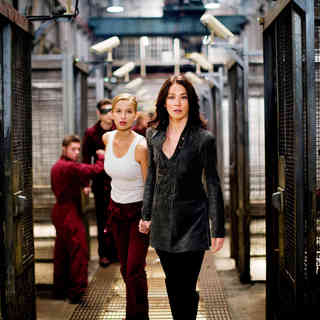 Tahyna Tozzi stars as Emma Frost and Lynn Collins stars as Silver Fox in The 20th Century Fox Pictures' X-Men Origins: Wolverine (2009). Photo credit by James Fisher.