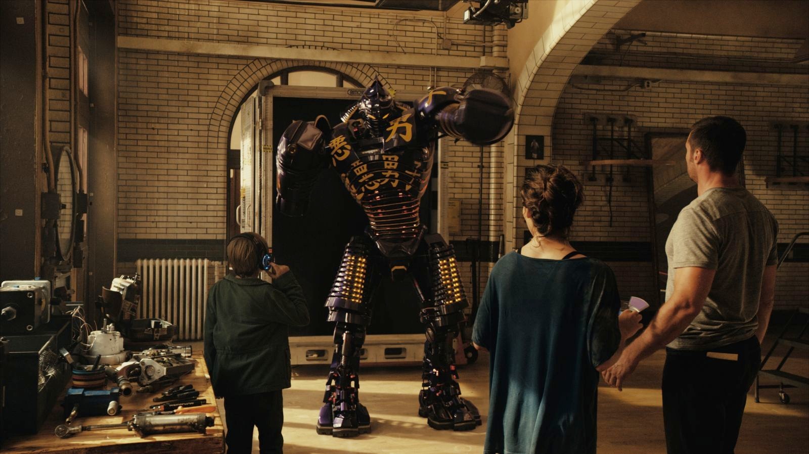 Dakota Goyo, Evangeline Lilly and Hugh Jackman in Walt Disney Pictures' Real Steel (2011)