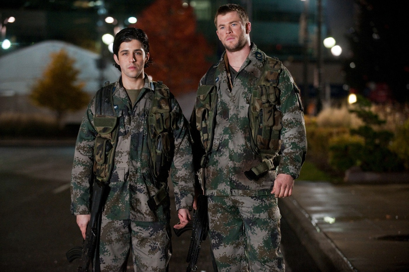 Josh Peck stars as Matt Eckert and Chris Hemsworth stars as Jed Eckert in FilmDistrict's Red Dawn (2012)