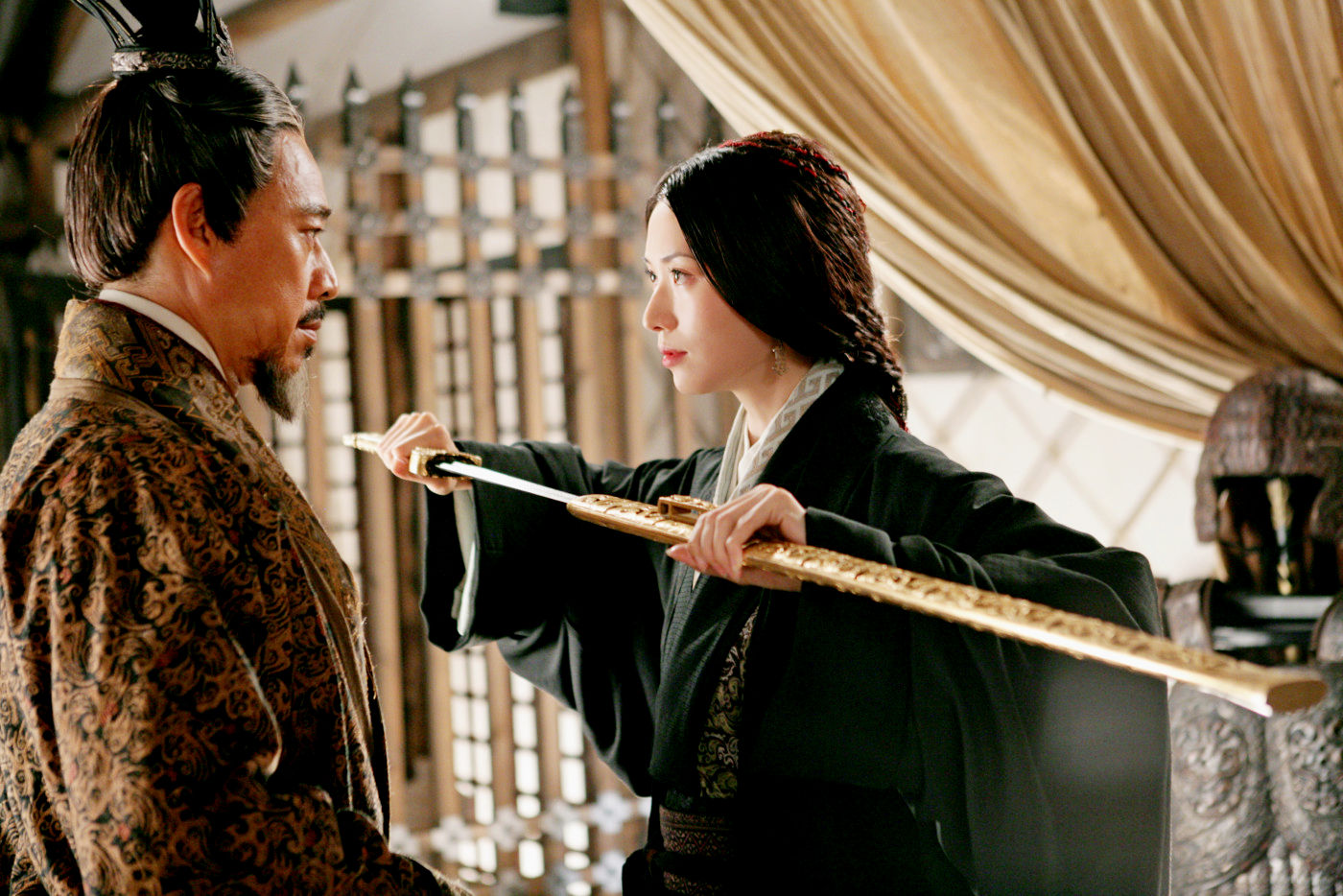 Zhang Fengyi stars as Cao Cao and Lin Chiling stars as Xiao Qiao in Magnolia Pictures' Red Cliff (2009)