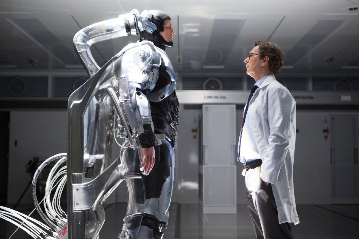 Joel Kinnaman stars as Alex Murphy/RoboCop and Gary Oldman stars as Dr. Dennett Norton in Columbia Pictures' RoboCop (2014). Photo credit by Kerry Hayes.