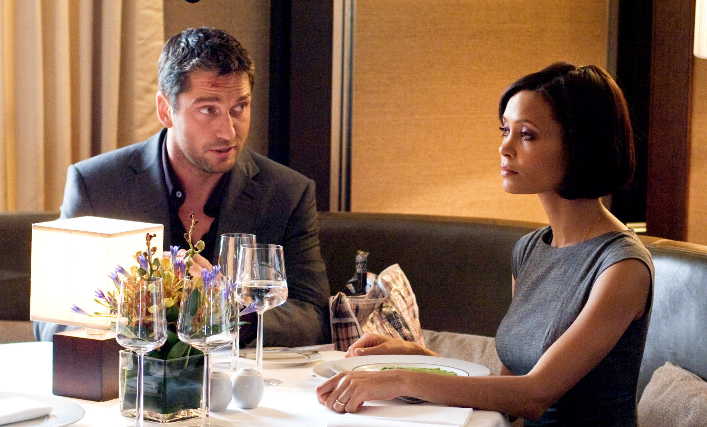 Gerard Butler stars as One Two and Thandie Newton stars as Stella in Warner Bros Pictures' RocknRolla (2008)