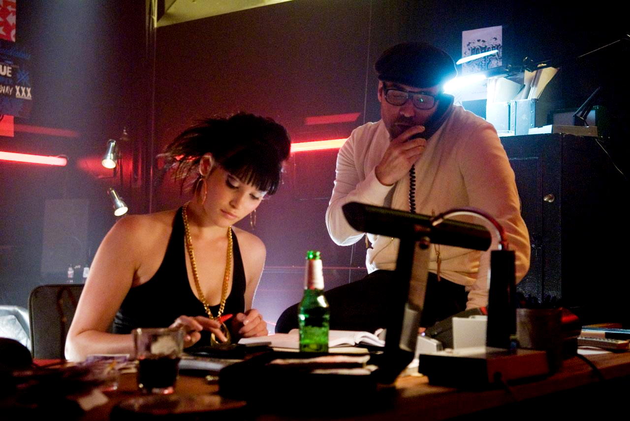 Gemma Arterton stars as June and Jeremy Piven stars as Roman in Warner Bros Pictures' RocknRolla (2008). Photo credit by Ollie Upton.