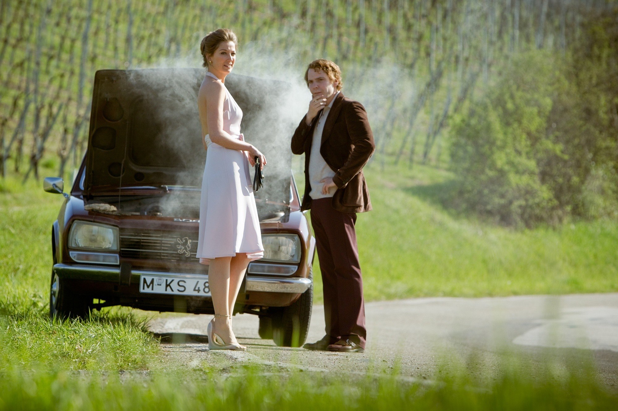 Alexandra Maria Lara stars as Marlene Lauda and Daniel Bruhl stars as Niki Lauda in Universal Pictures' Rush (2013)