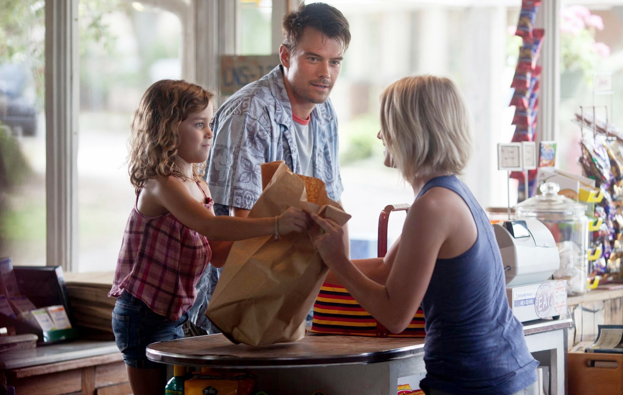 Mimi Kirkland, Josh Duhamel and Julianne Hough in Relativity Media's Safe Haven (2013)