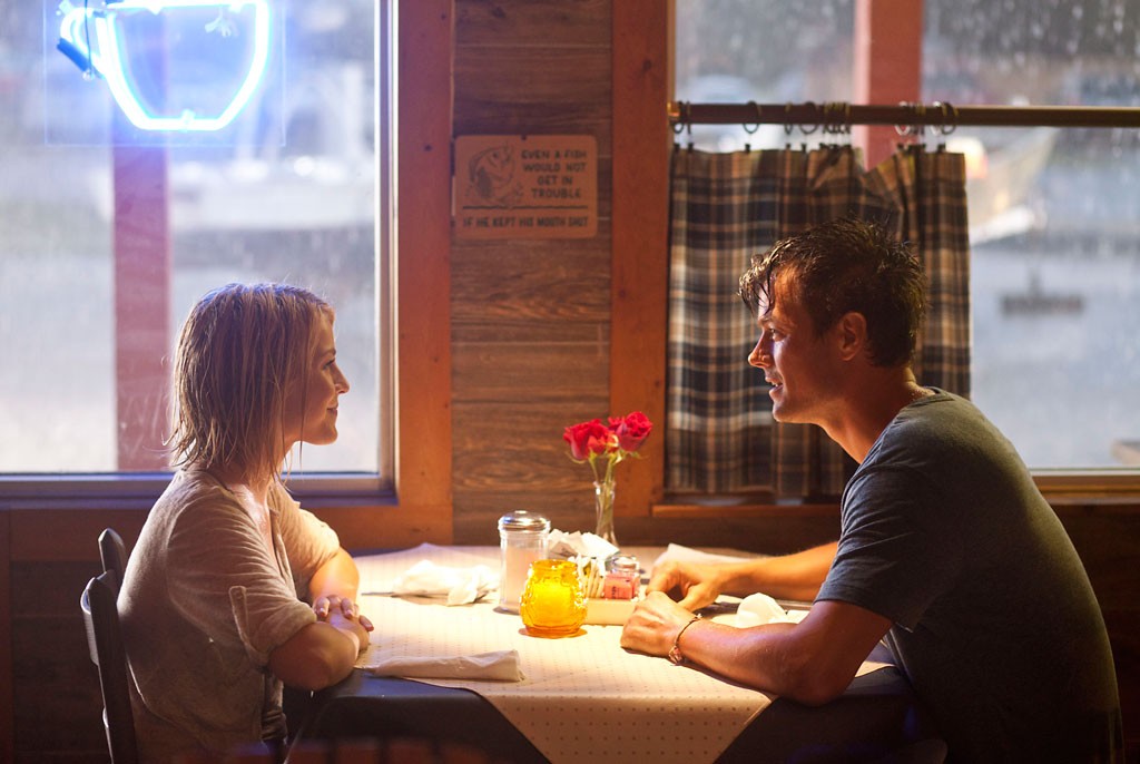 Julianne Hough stars as Katie Feldman and Josh Duhamel stars as Alex Wheatley in Relativity Media's Safe Haven (2013)