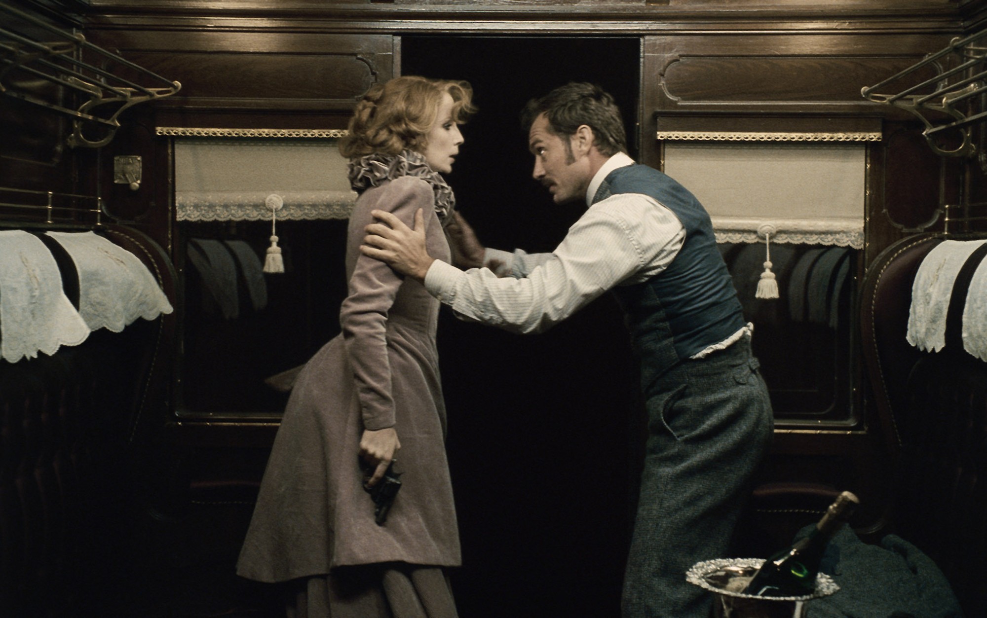 Kelly Reilly stars as Mary Morstan and Jude Law stars as Dr. John Watson in Warner Bros. Pictures' Sherlock Holmes: A Game of Shadows (2011)