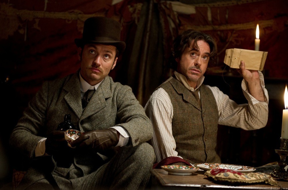 Jude Law stars as Dr. John Watson and Robert Downey Jr. stars as Sherlock Holmes in Warner Bros. Pictures' Sherlock Holmes: A Game of Shadows (2011)