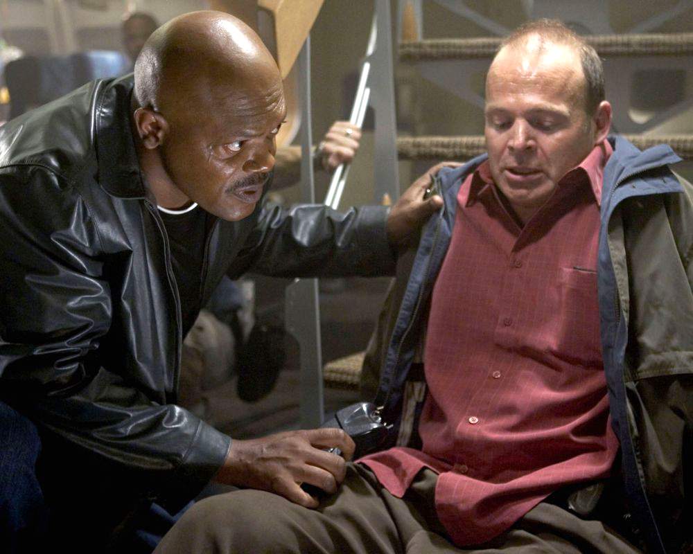 Samuel L. Jackson as Nelville Flynn and Mark Houghton as John Saunders in New Line Cinema's Snakes on a Plane (2006)