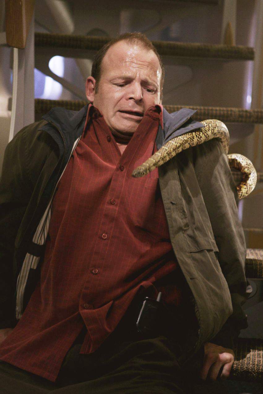 Mark Houghton as John Saunders in New Line Cinema's Snakes on a Plane (2006)