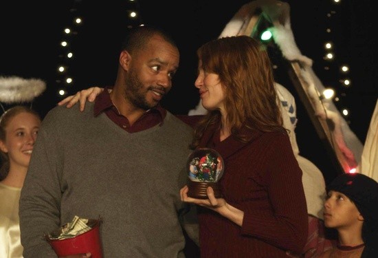 Donald Faison stars as Ted and Alicia Witt stars as Meg in Lifetime's An Snow Globe Christmas (2013)