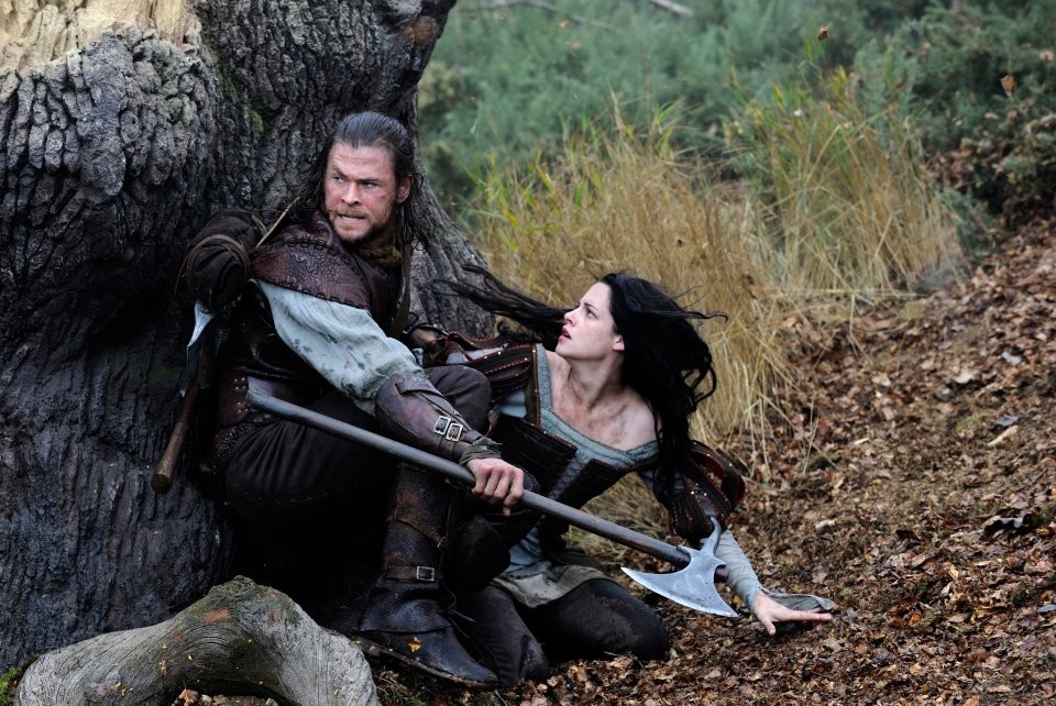 Chris Hemsworth stars as The Huntsman and Kristen Stewart stars as Snow White in Universal Pictures' Snow White and the Huntsman (2012)