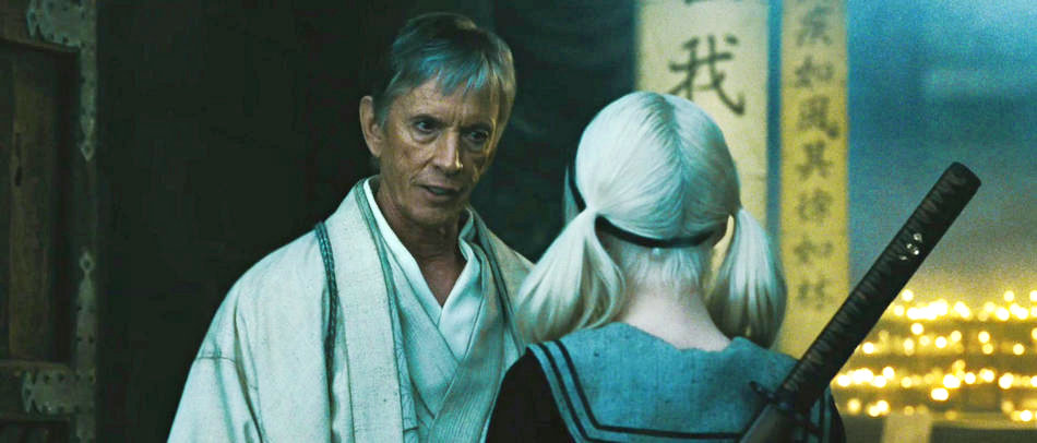 Scott Glenn stars as Wiseman and Emily Browning stars as Baby Doll in Warner Bros. Pictures' Sucker Punch (2011)