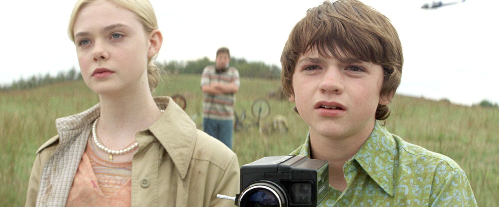 Elle Fanning stars as Alice Dainard and Joel Courtney stars as Joe Lamb in Paramount Pictures' Super 8 (2011)