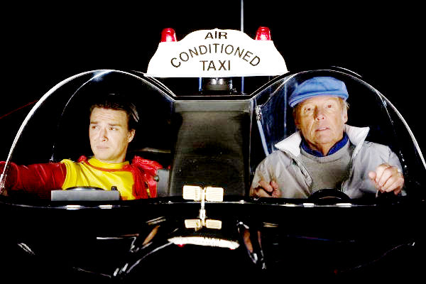 Justin Whalin stars as Ed Gruberman and Adam West stars as Cab Driver in Roadside Attractions' Super Capers (2009)