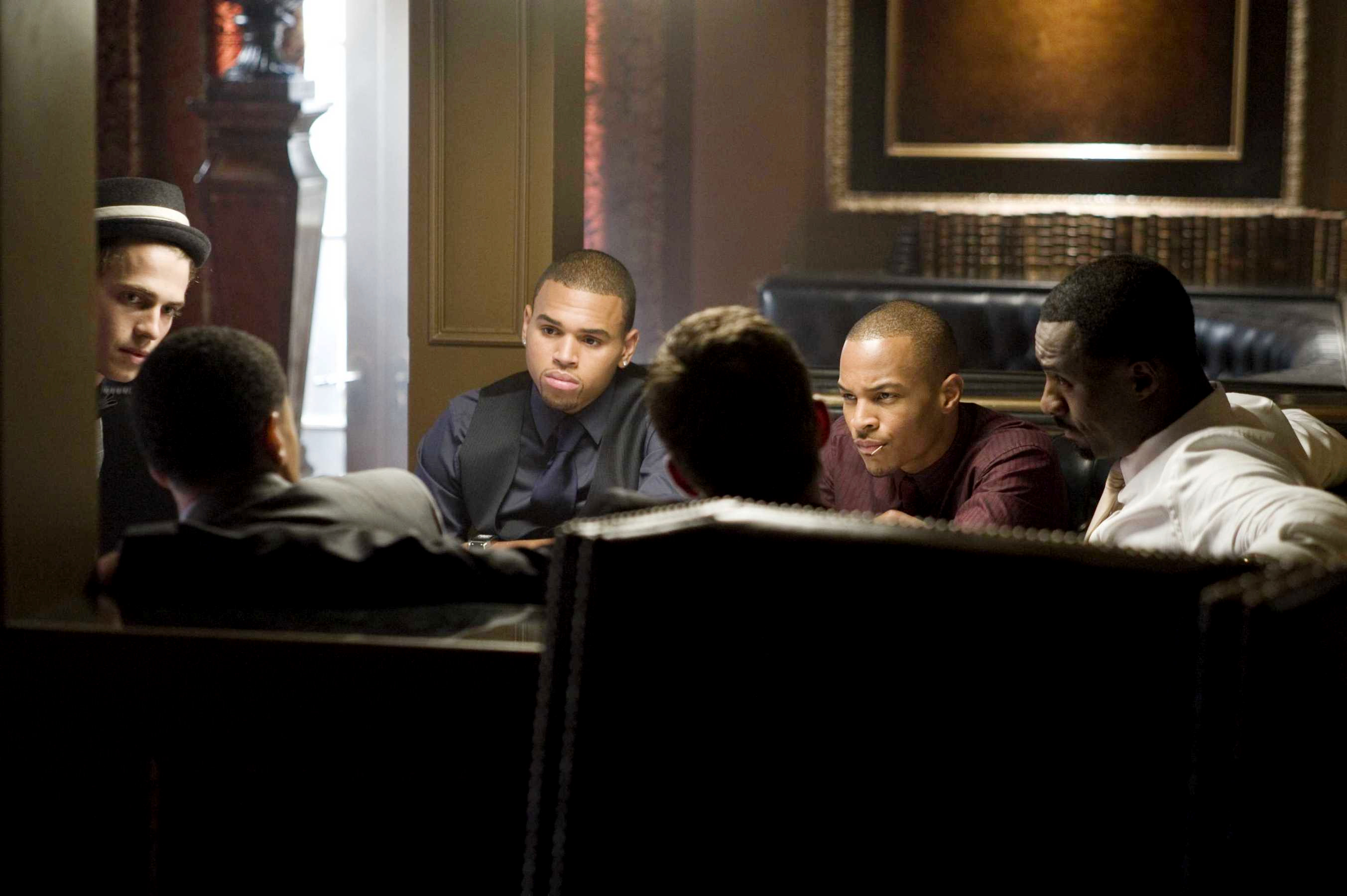 Chris Brown stars as Jesse Attica and T.I. stars as Ghost in Screen Gems' Takers (2010)
